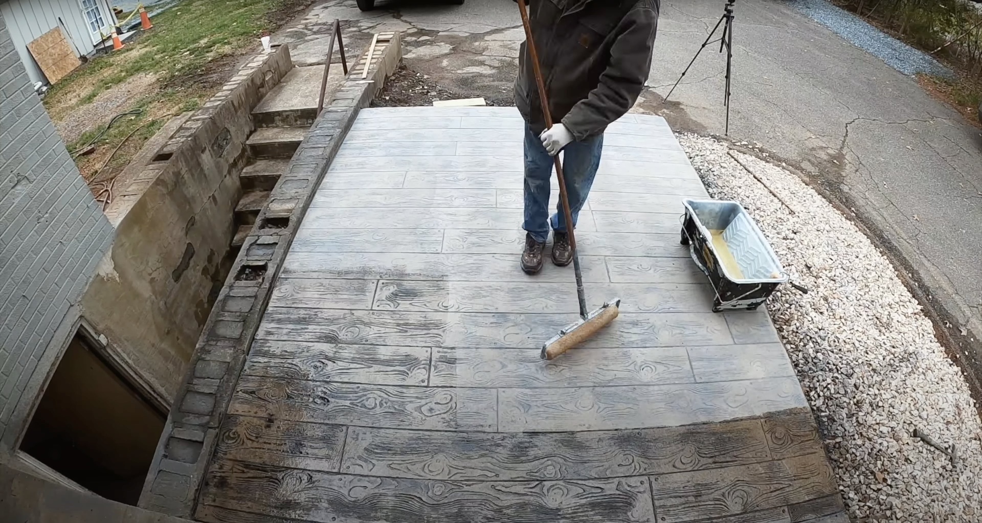 Gary Concrete - Expert stamped and decorative concrete services Professional stamped concrete installation showing detailed wood grain pattern texture