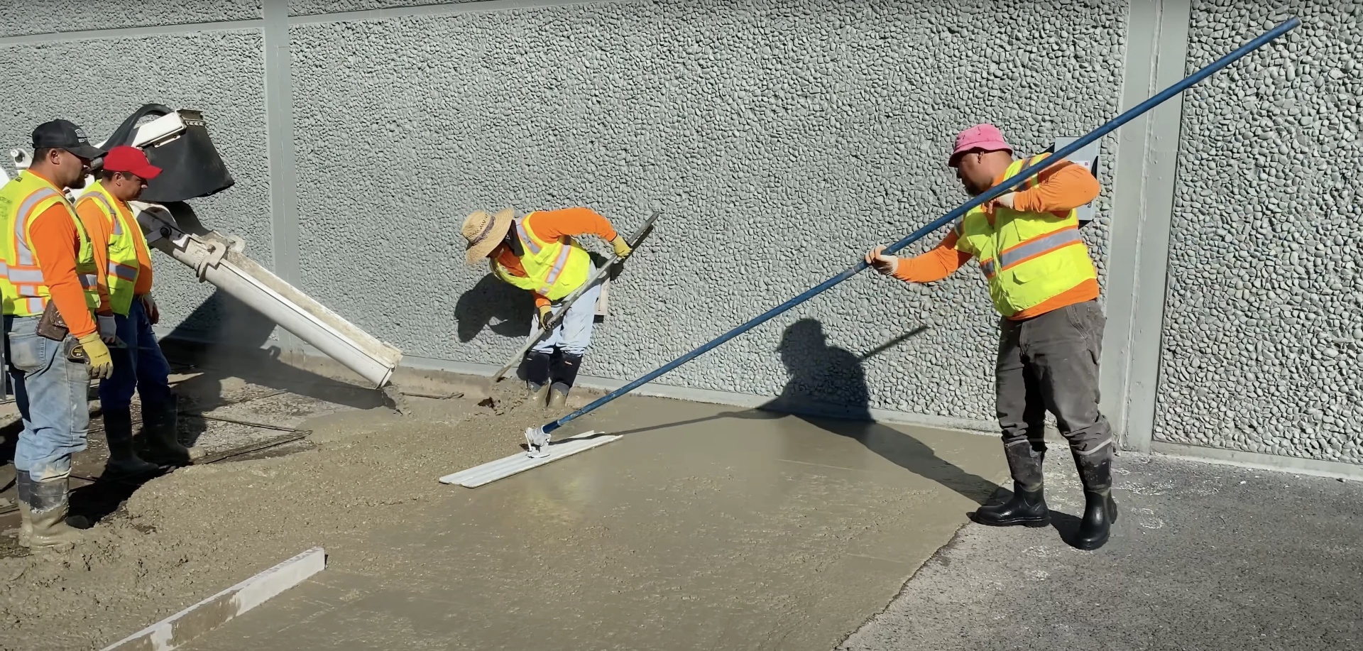 Gary Concrete - Professional concrete finishing and screeding techniques Professional concrete finishing team using specialized screeding equipment