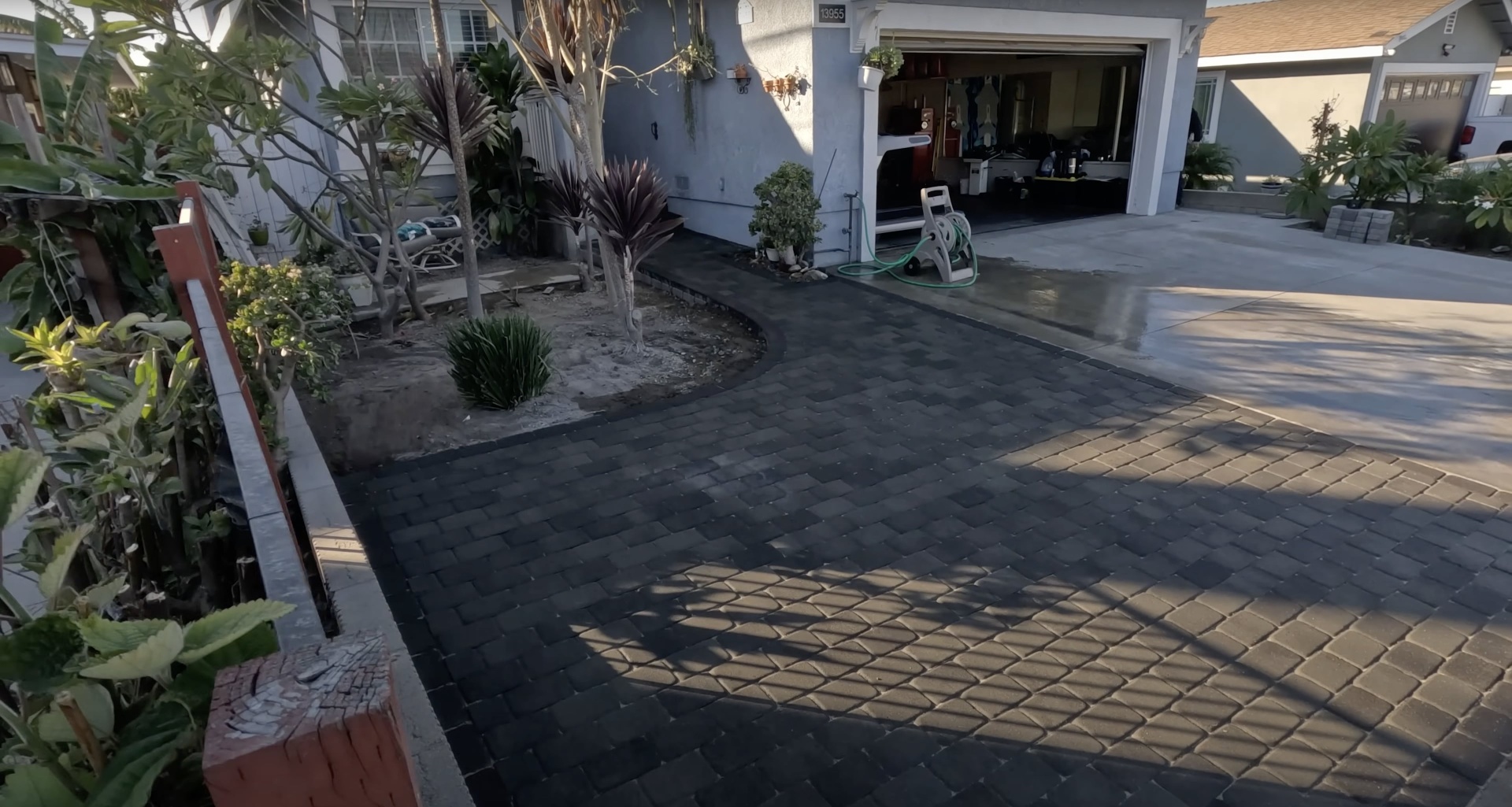 Gary Concrete - Decorative concrete and paver combination driveway installation Beautiful decorative concrete driveway with paver accents by Gary Concrete